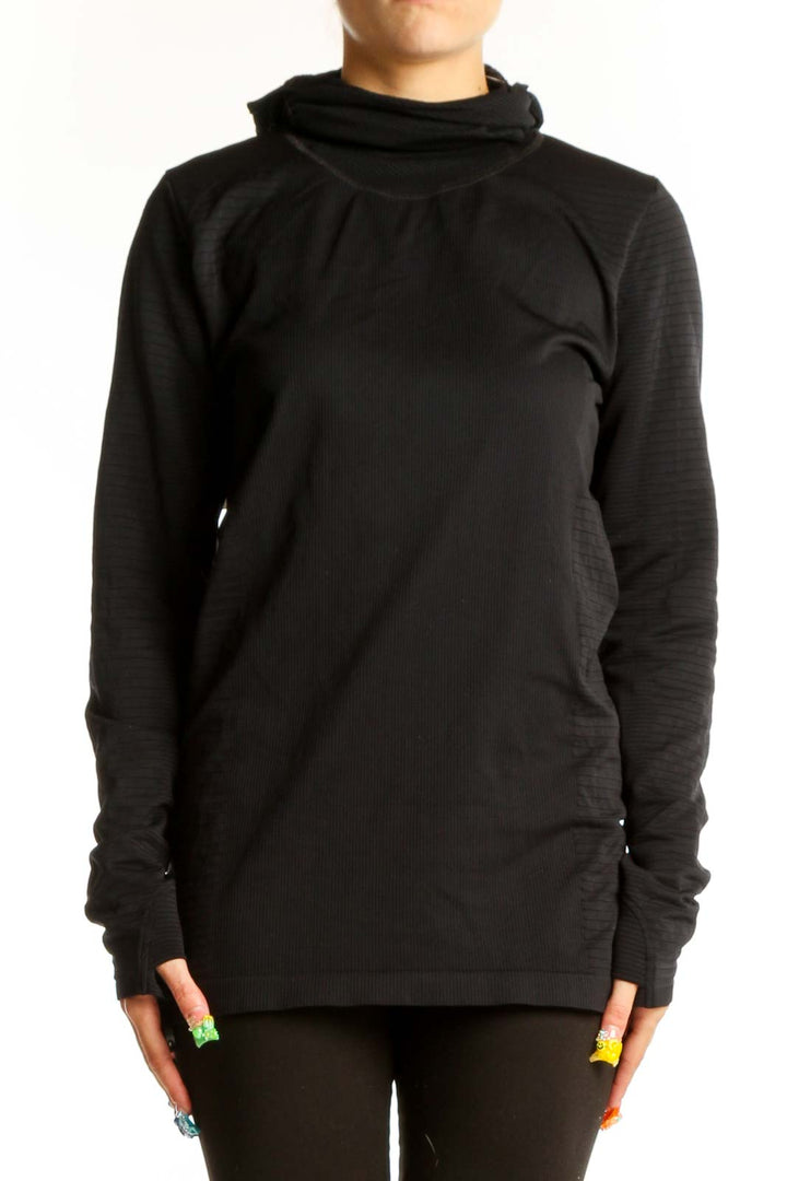 Front view of black Athleta activewear top with cowl neck