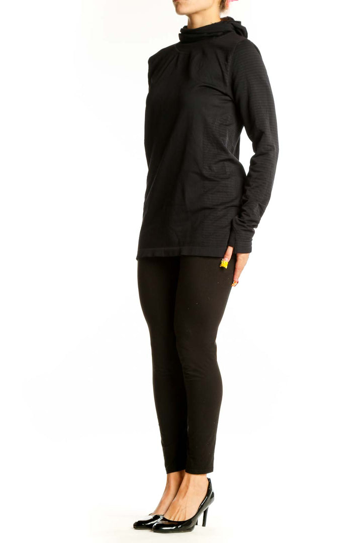 Front view of black Athleta activewear top with cowl neck