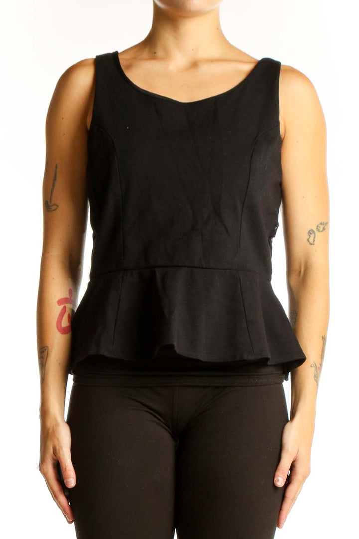 Front view of black sleeveless peplum top by Express