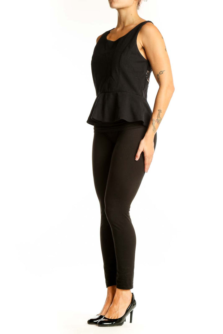 Front view of black sleeveless peplum top by Express
