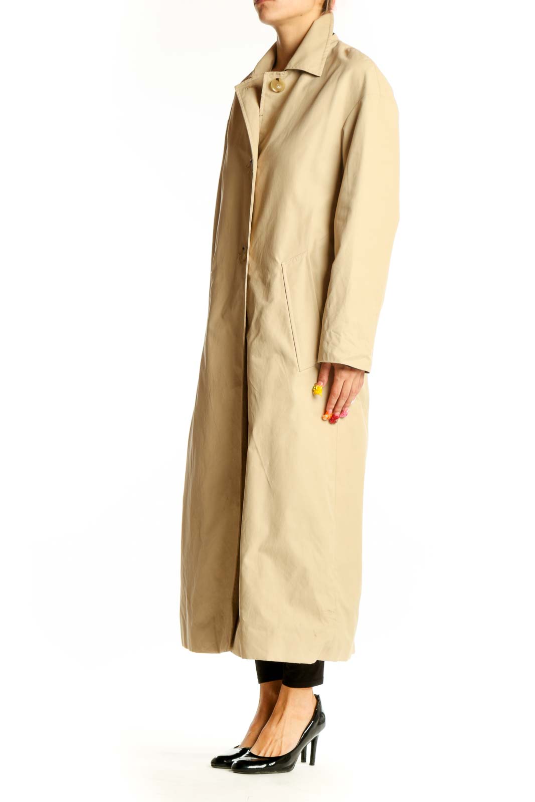 Front view of Mango beige long button-up coat