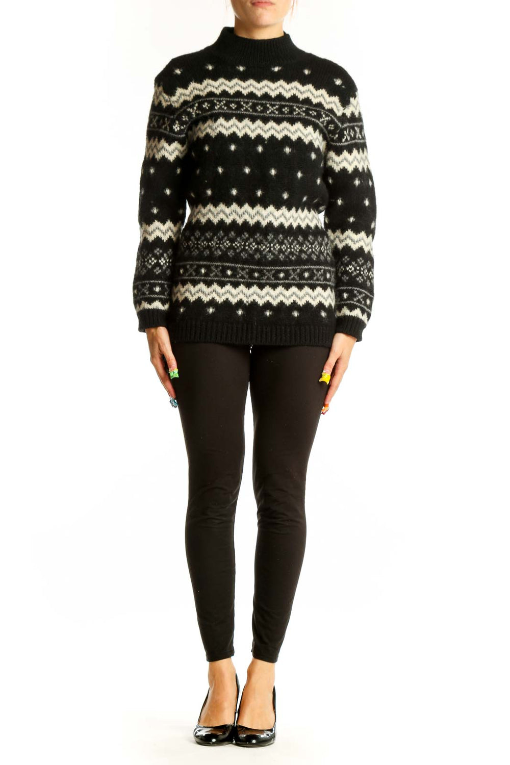 Front view of SilkRoll black and white Fair Isle wool sweater with mock turtleneck