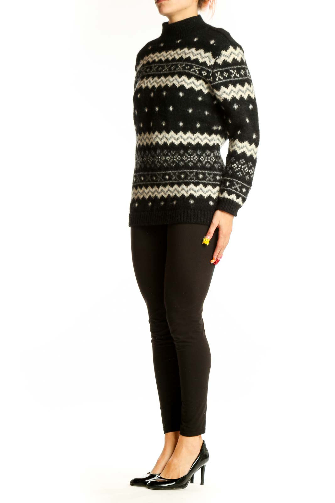 Front view of SilkRoll black and white Fair Isle wool sweater with mock turtleneck