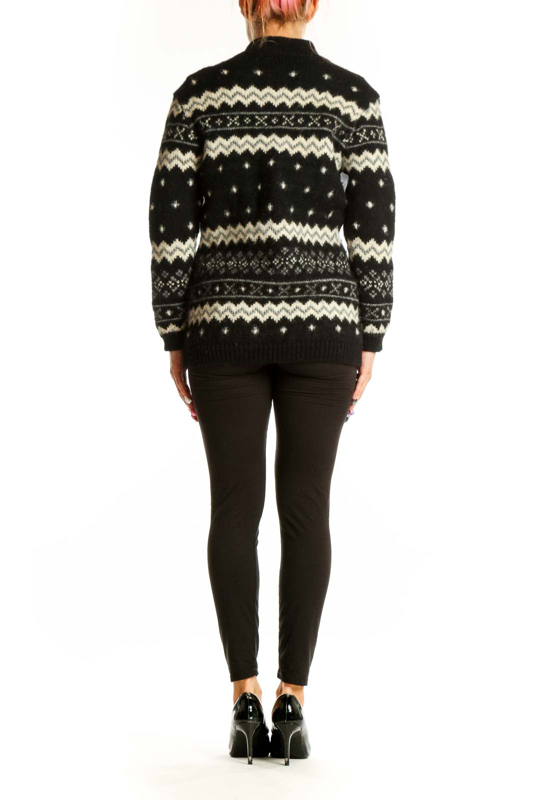 Side view of SilkRoll black and white Fair Isle wool sweater showing pattern detail