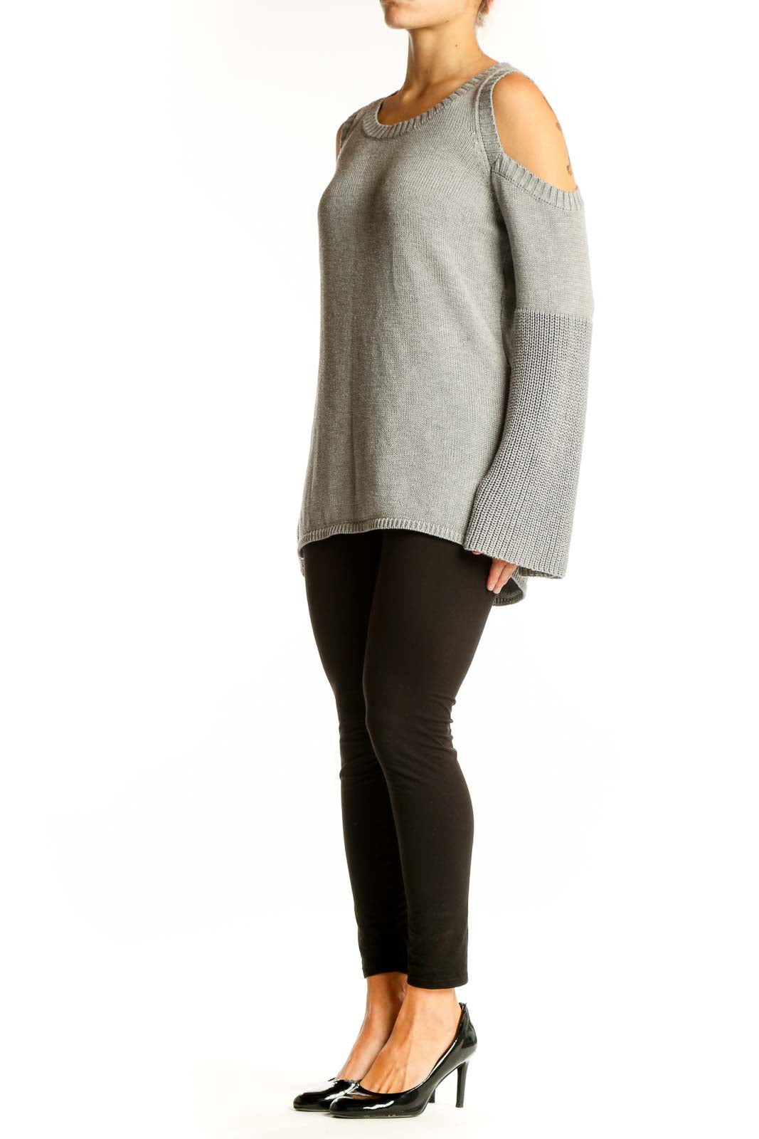 Front view of gray cold shoulder knit sweater with bell sleeves