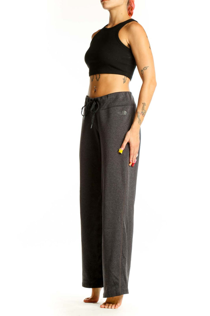 Front view of gray The North Face polyester lounge pants with drawstring waist