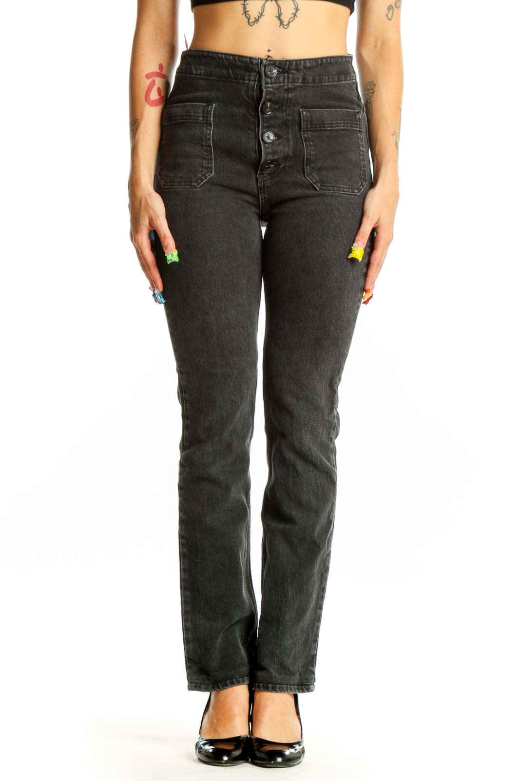 Front view of Reformation black straight leg jeans with button-fly and patch pockets