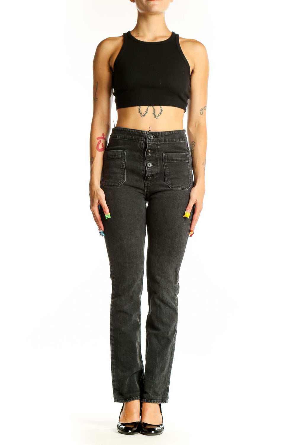 Front view of Reformation black straight leg jeans with button-fly and patch pockets