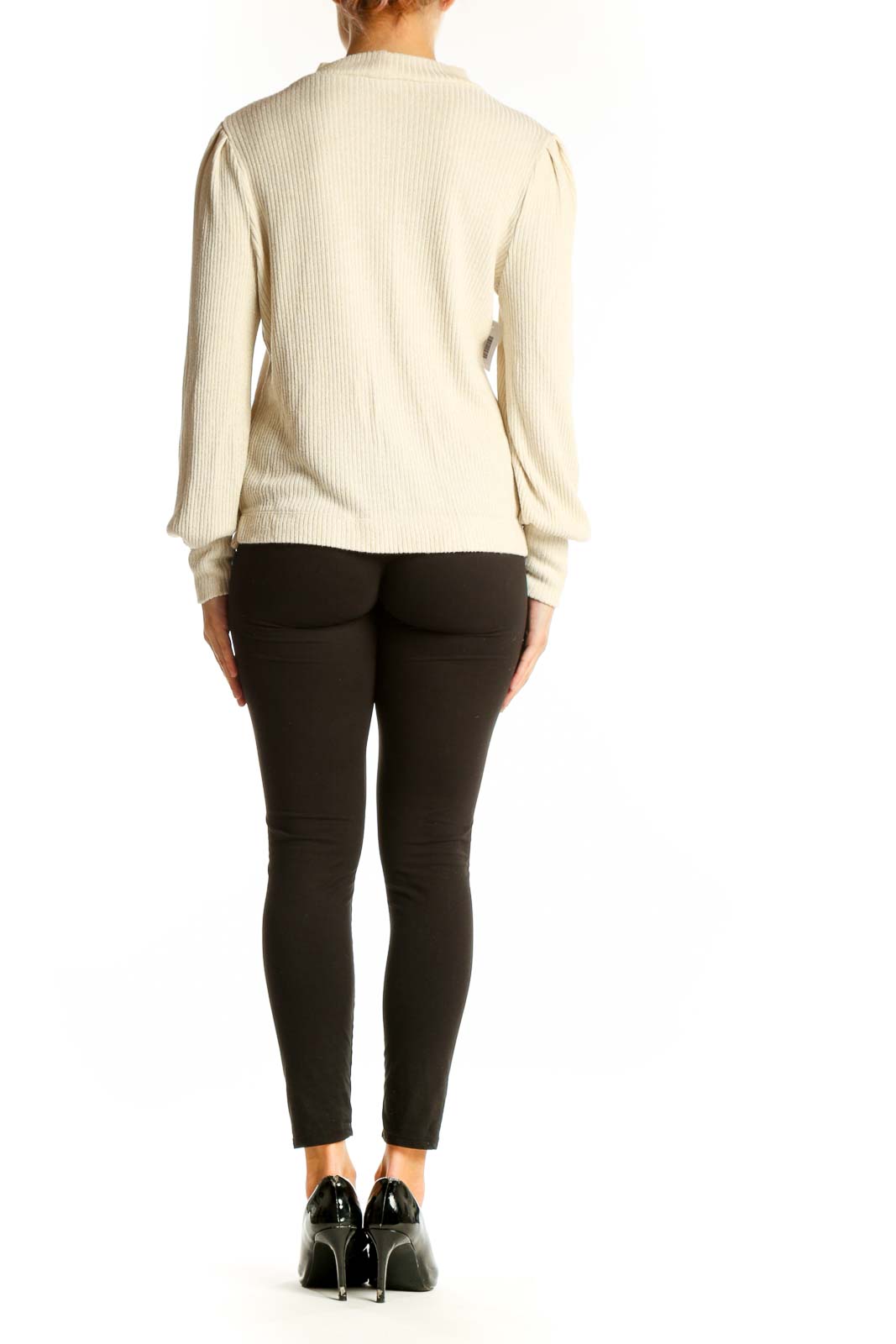 Side view of LOFT cream ribbed mock neck sweater showing puff sleeve detail