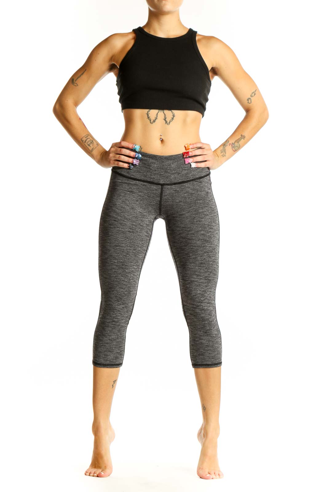 Front view of gray heathered Athleta capri leggings on model