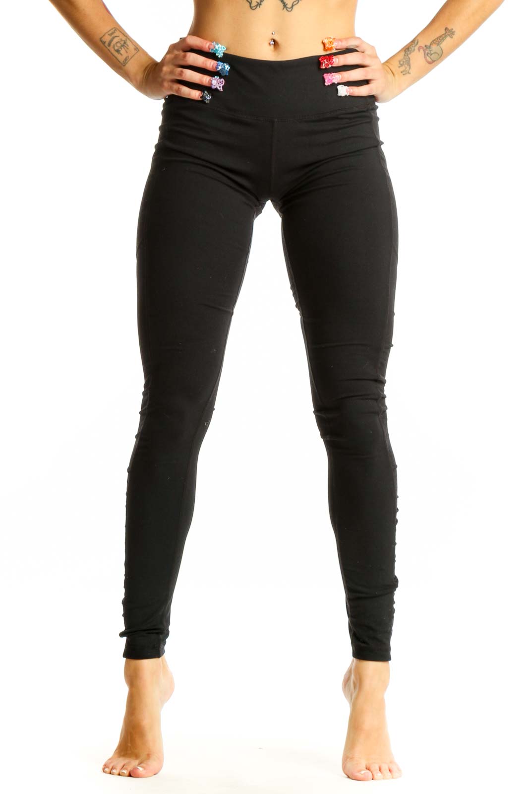 Front view of black Lululemon high-waisted performance leggings