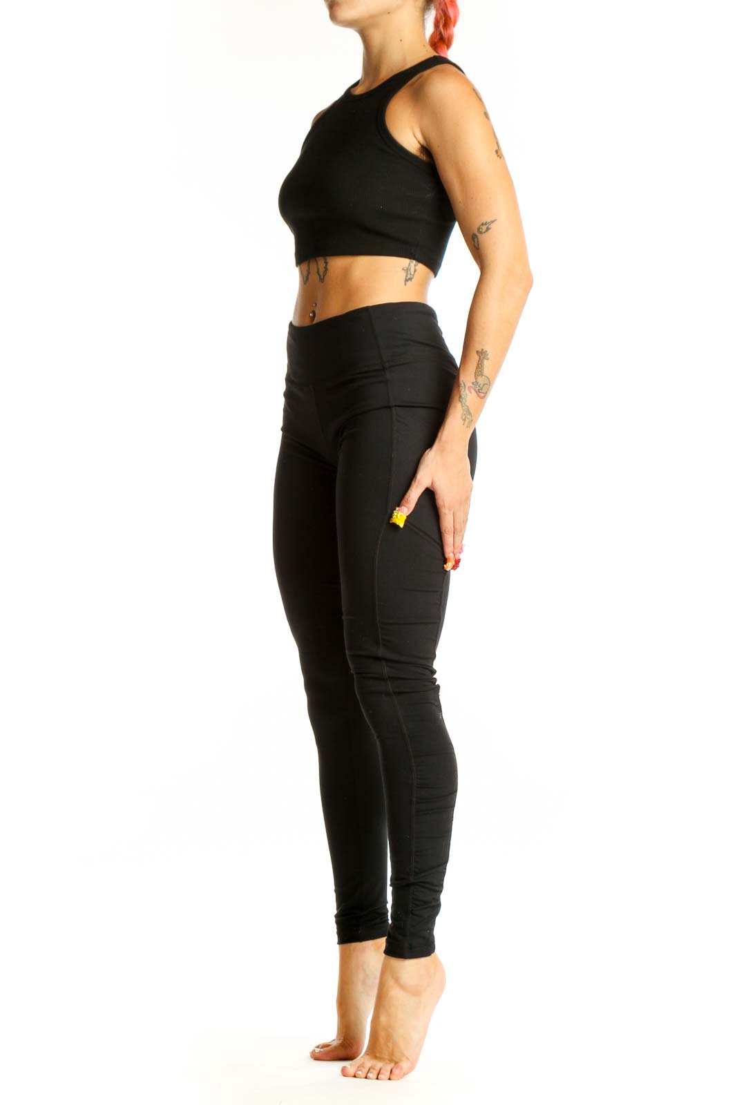 Front view of black Lululemon high-waisted performance leggings