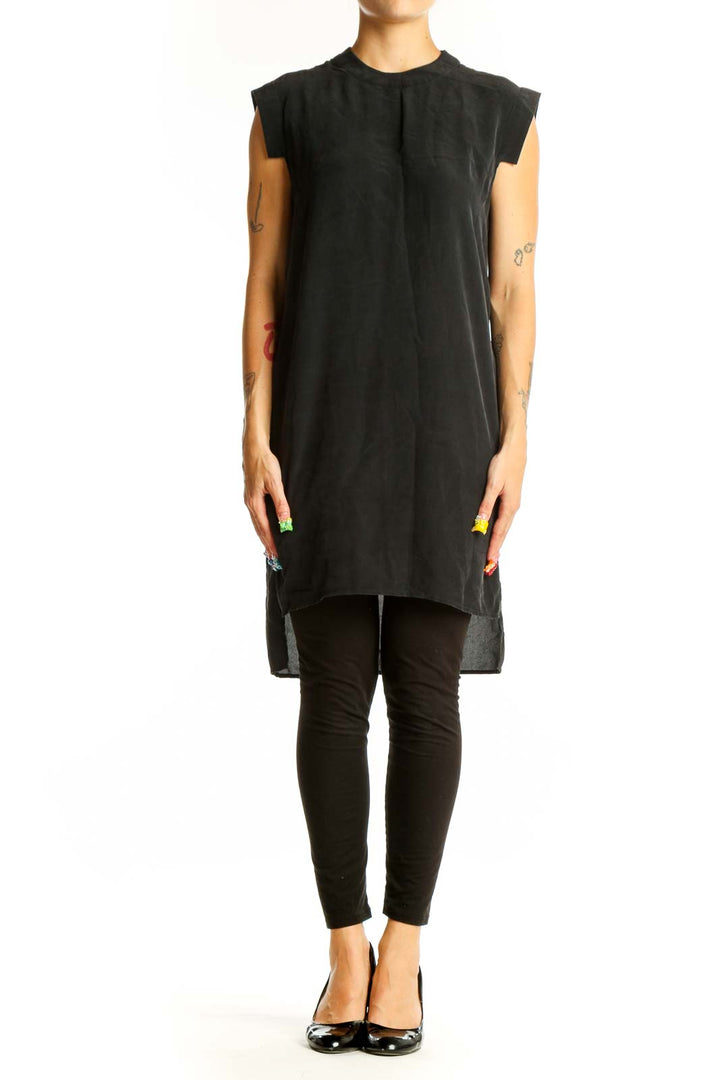 Front view of All Saints black silk sleeveless tunic with high neckline