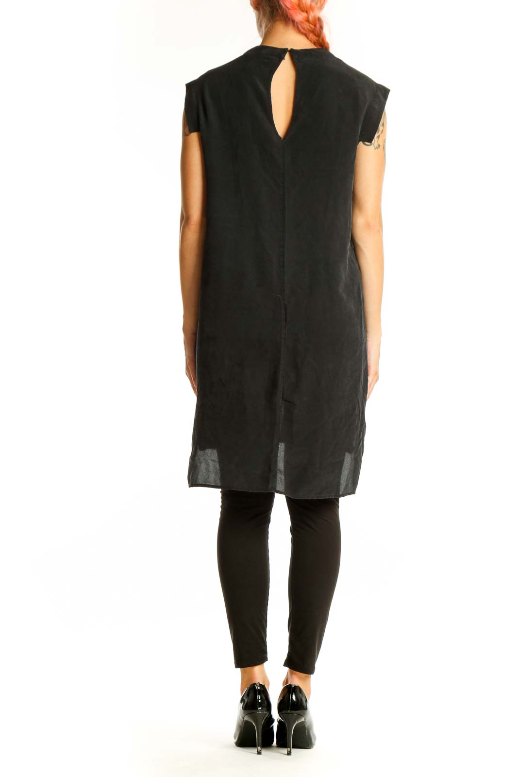 Side view of All Saints black silk tunic showing high-low hemline