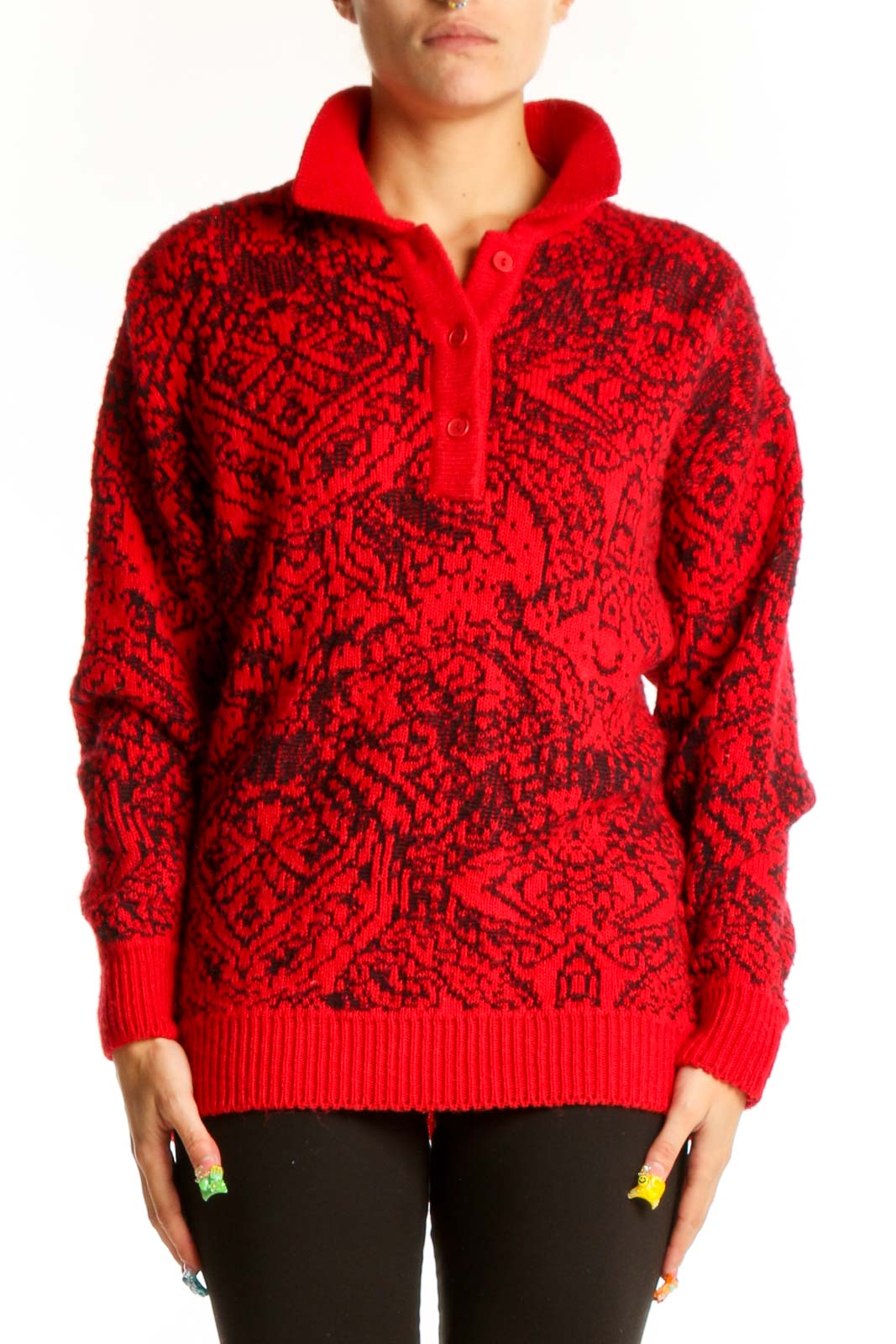 Front view of red M/a/s/e/r knit sweater with black geometric pattern