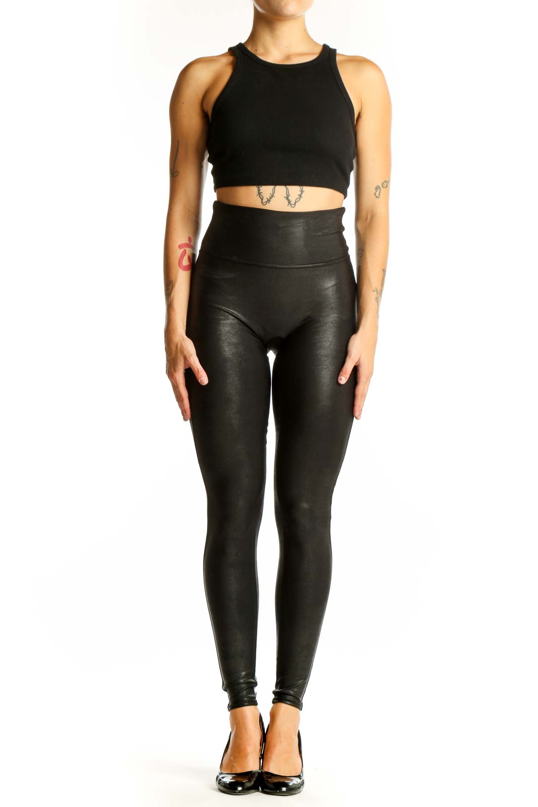 Front view of Spanx black high-waisted faux leather leggings