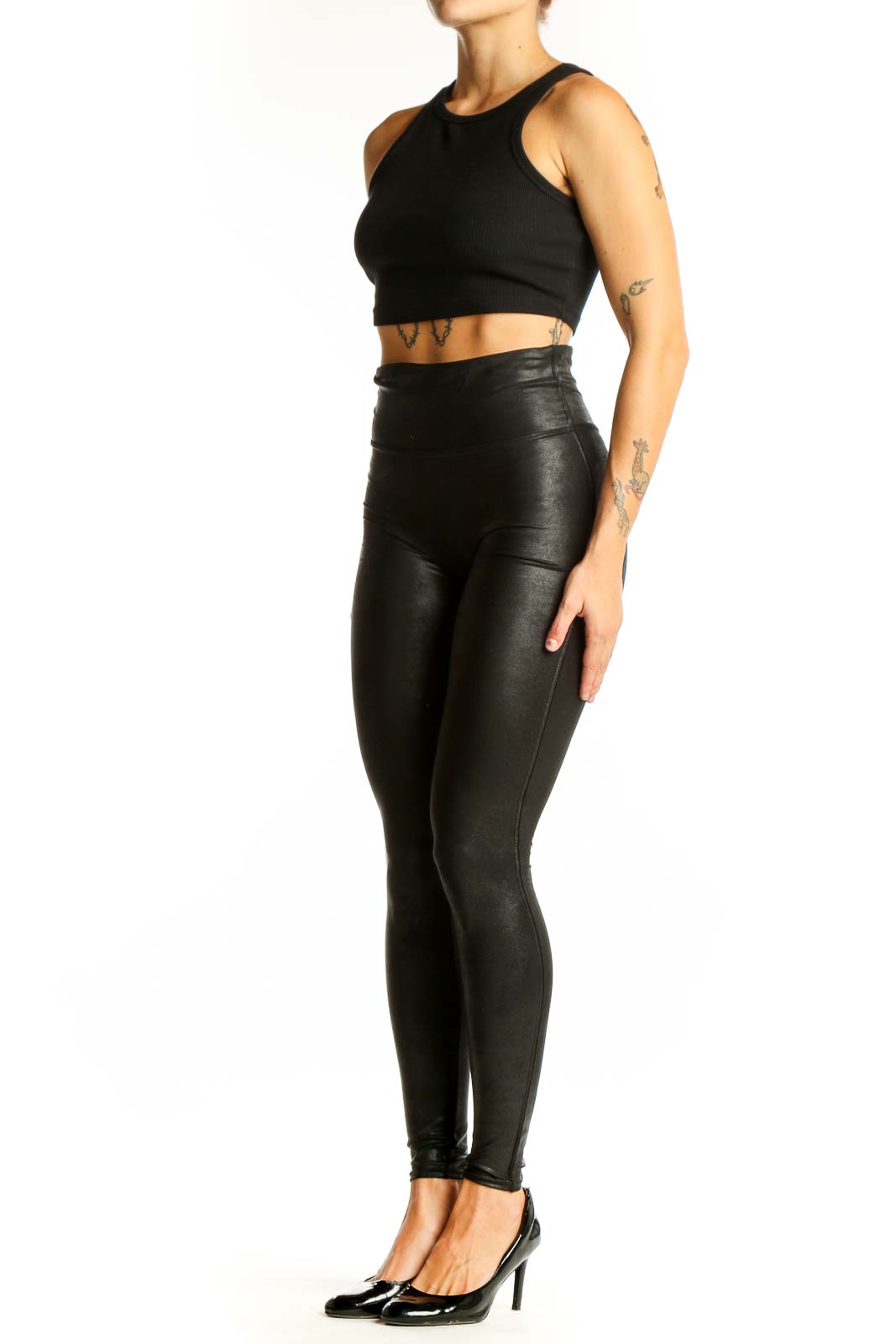 Front view of Spanx black high-waisted faux leather leggings