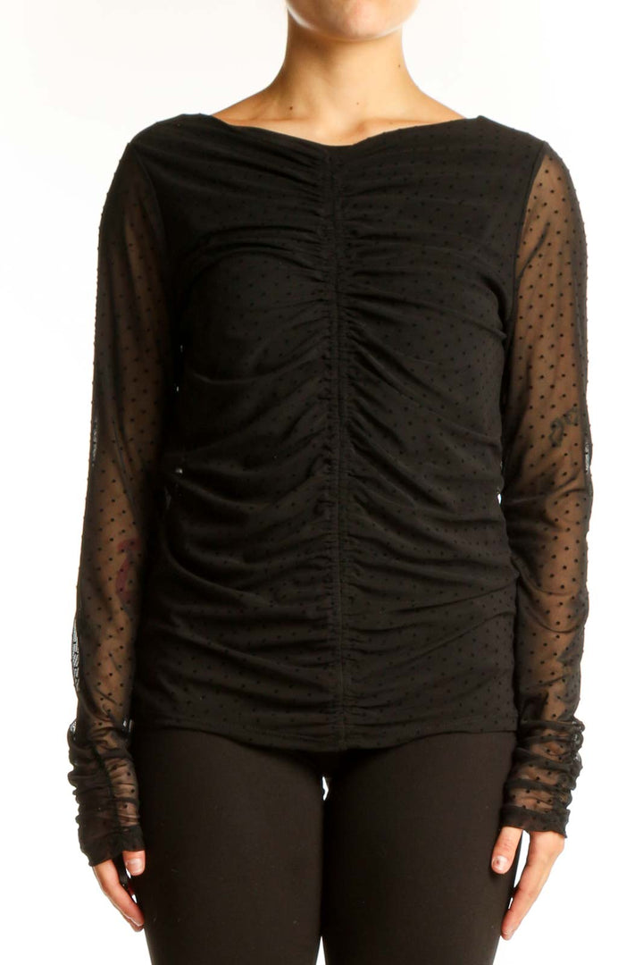 Front view of black ruched top with sheer polka dot sleeves by LAUNDRY by SHELLI SEGAL