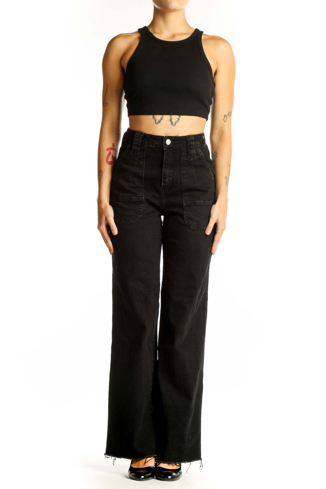 Front view of black wide-leg denim jeans with patch pockets