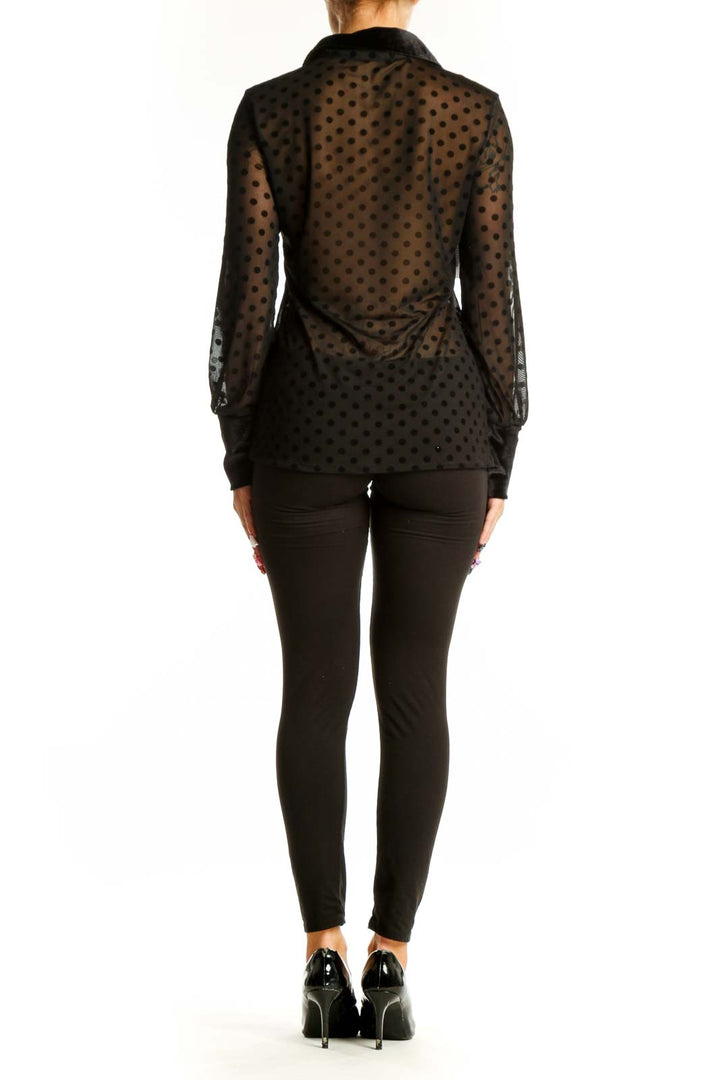 Back view of black sheer polka dot button-up blouse by SilkRoll