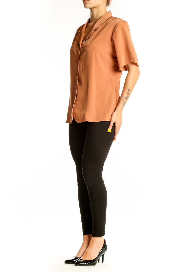 Front view of Maggie Sweet terracotta button-up short sleeve blouse