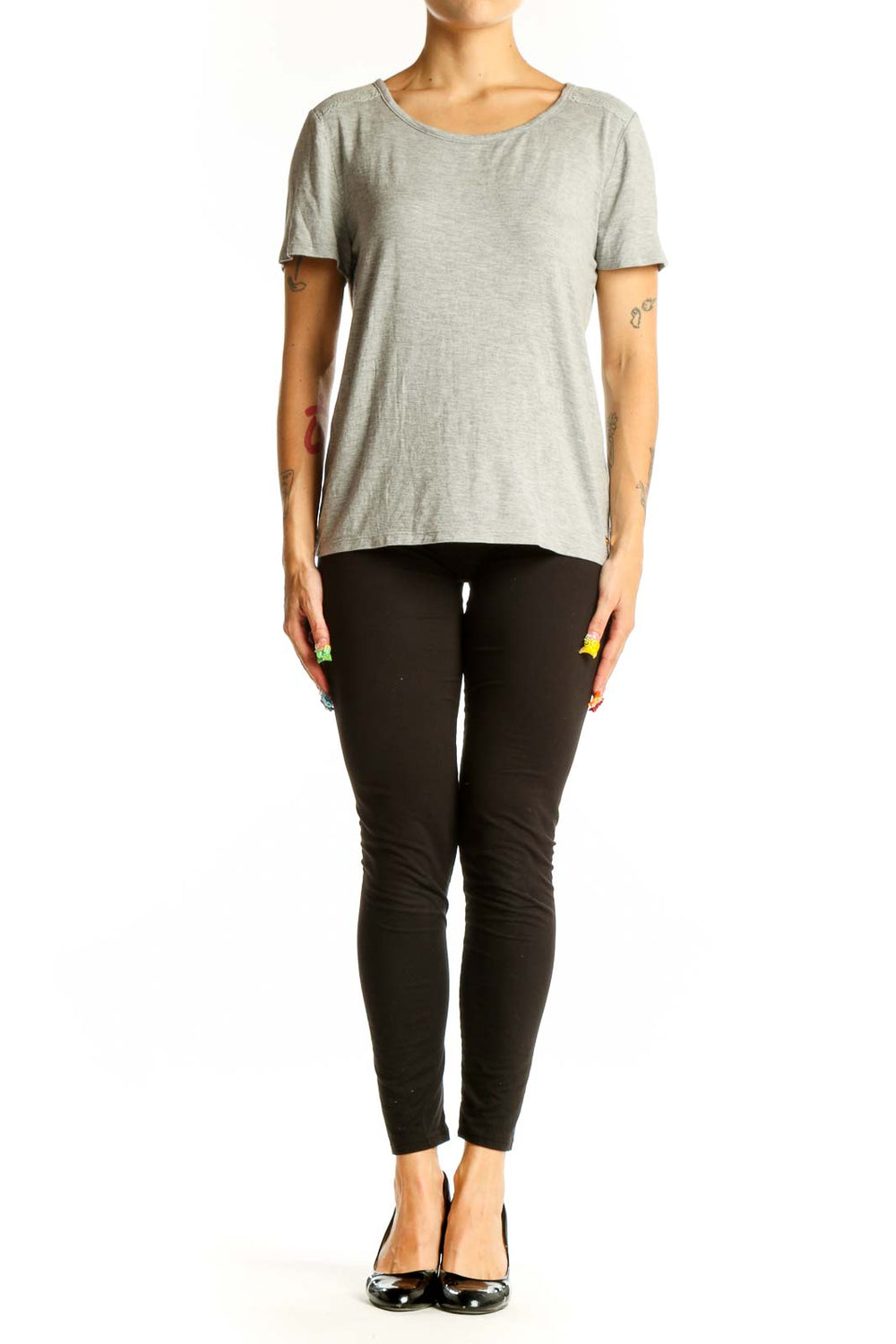 Front view of gray Juicy Couture short sleeve top on model