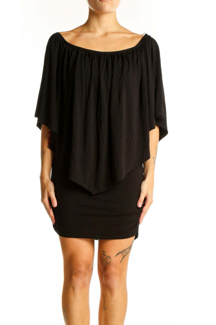 Front view of black off-shoulder mini dress with draped overlay from Boston Proper