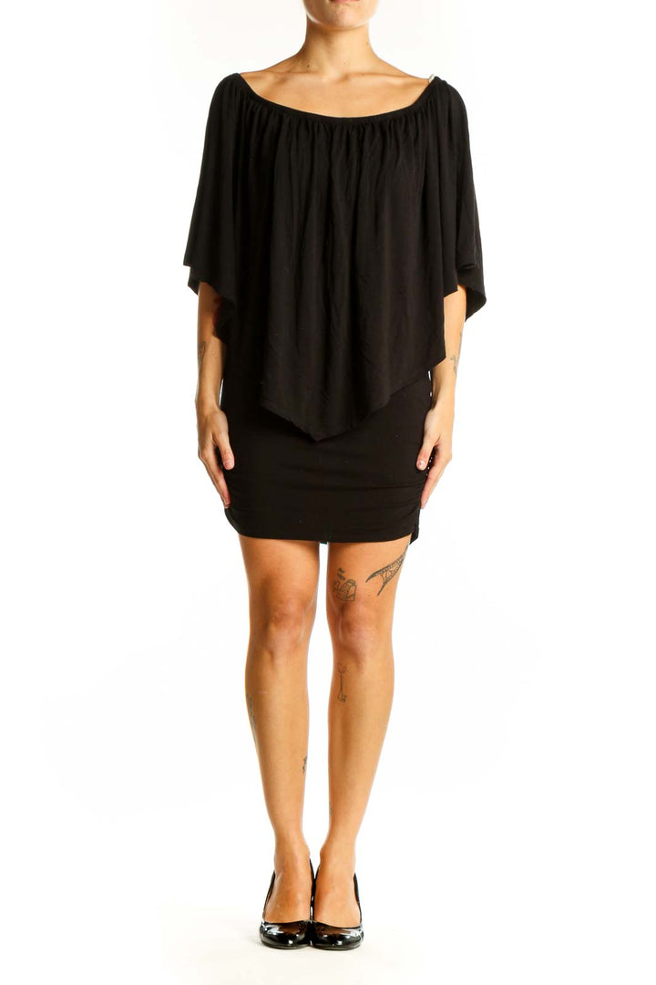 Front view of black off-shoulder mini dress with draped overlay from Boston Proper