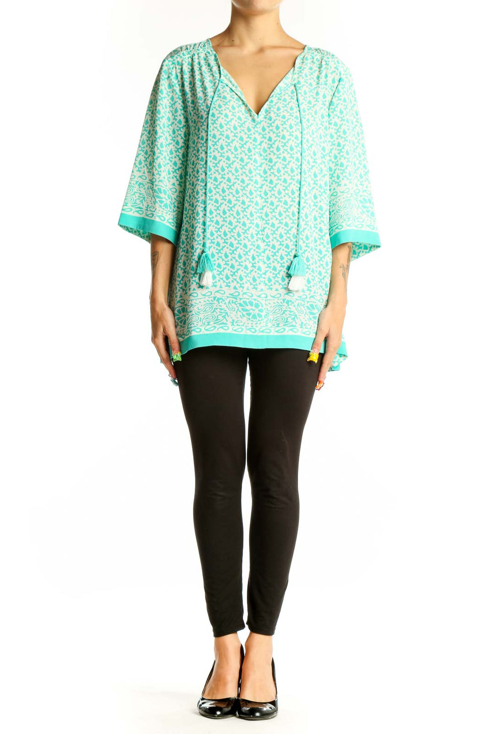 Front view of Chaus mint floral print tunic top with V-neck and tassel ties