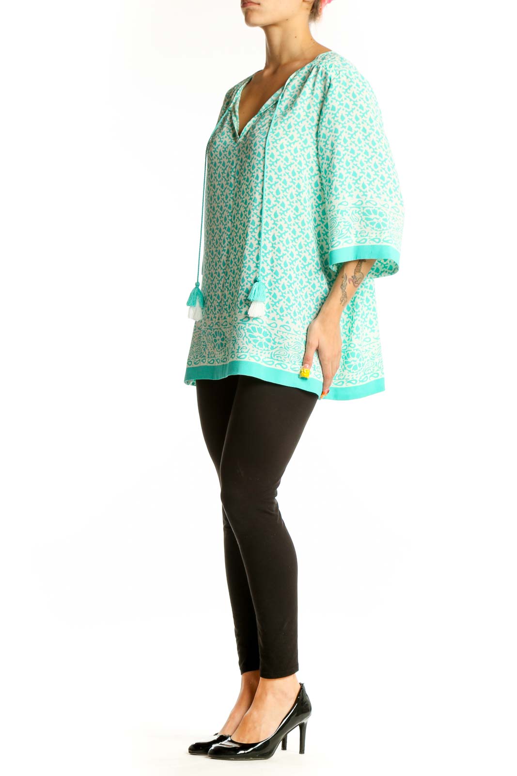 Front view of Chaus mint floral print tunic top with V-neck and tassel ties