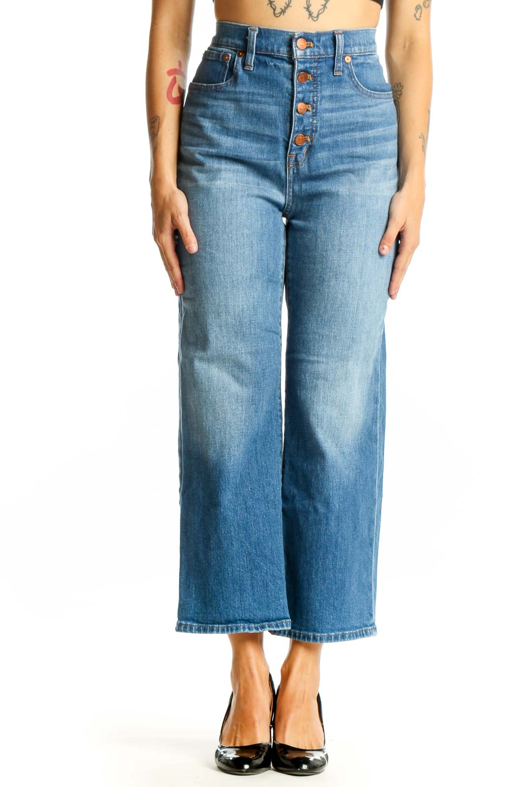 Front view of Madewell blue wide-leg jeans with button-fly closure