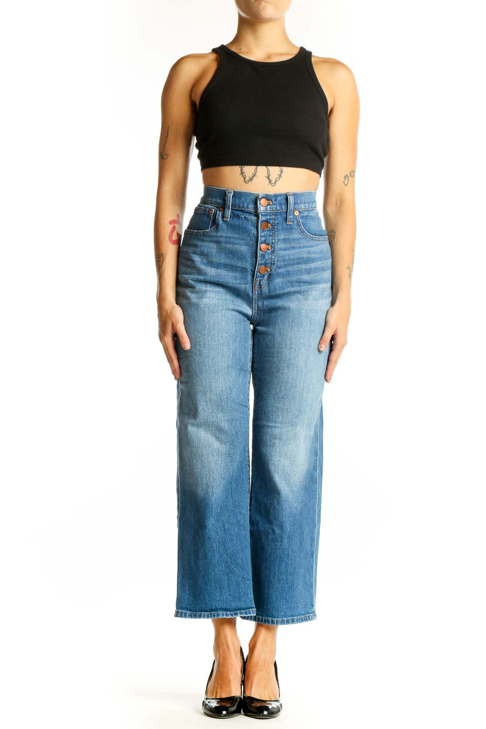 Front view of Madewell blue wide-leg jeans with button-fly closure