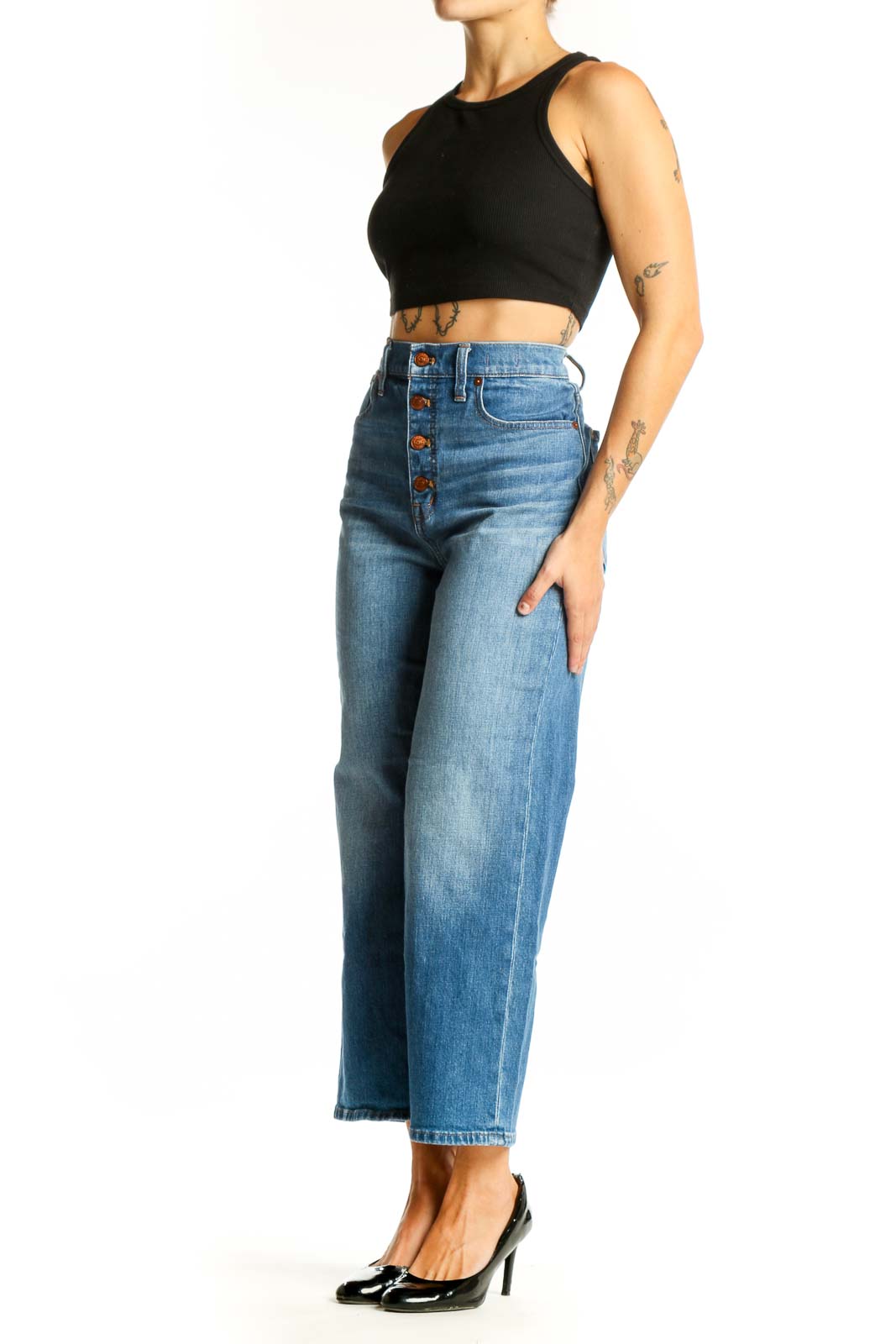 Front view of Madewell blue wide-leg jeans with button-fly closure