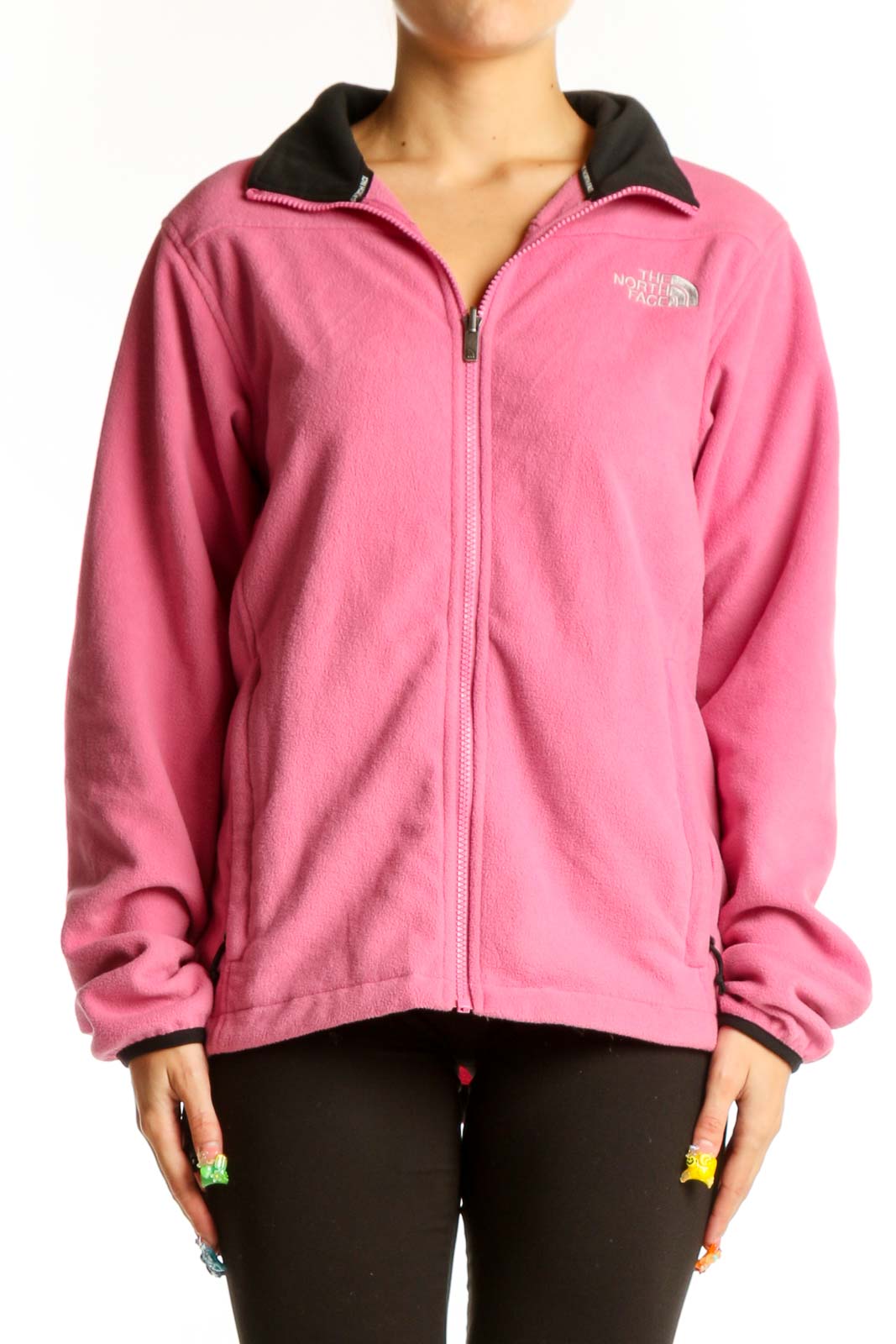 Front view of pink The North Face fleece jacket with black collar and full zipper