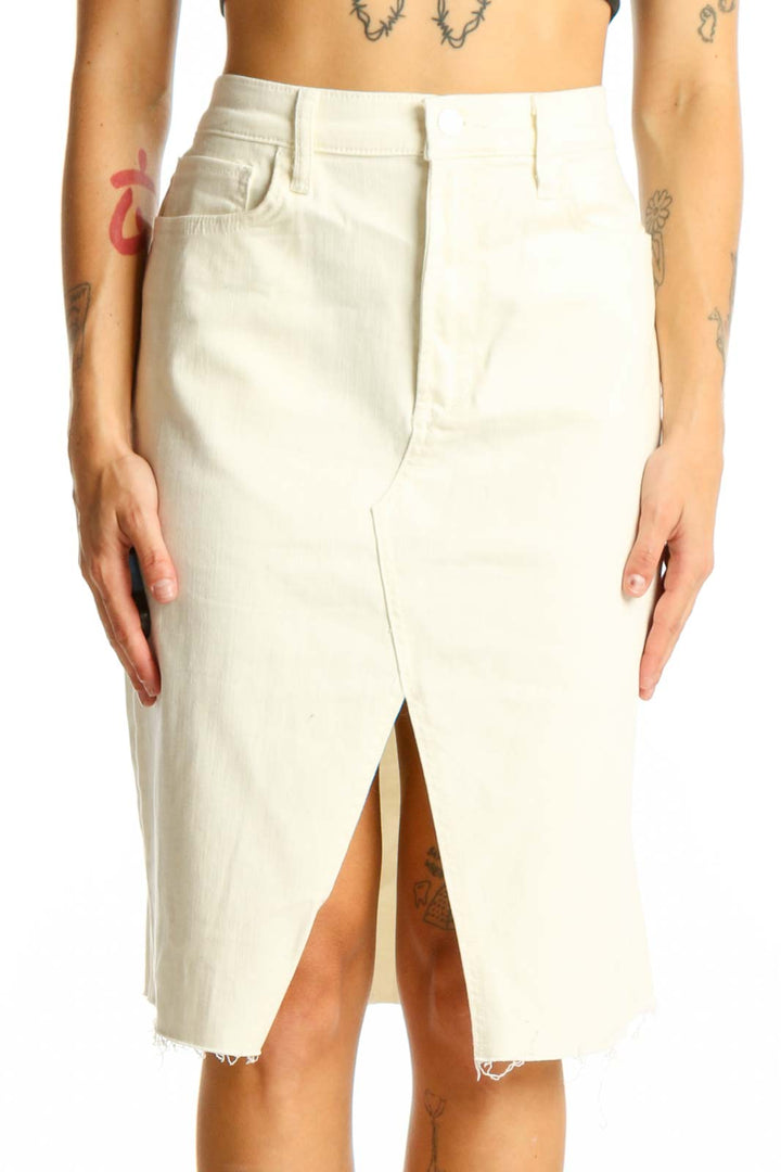 Front view of Joe's cream denim midi skirt with front slit and raw hem