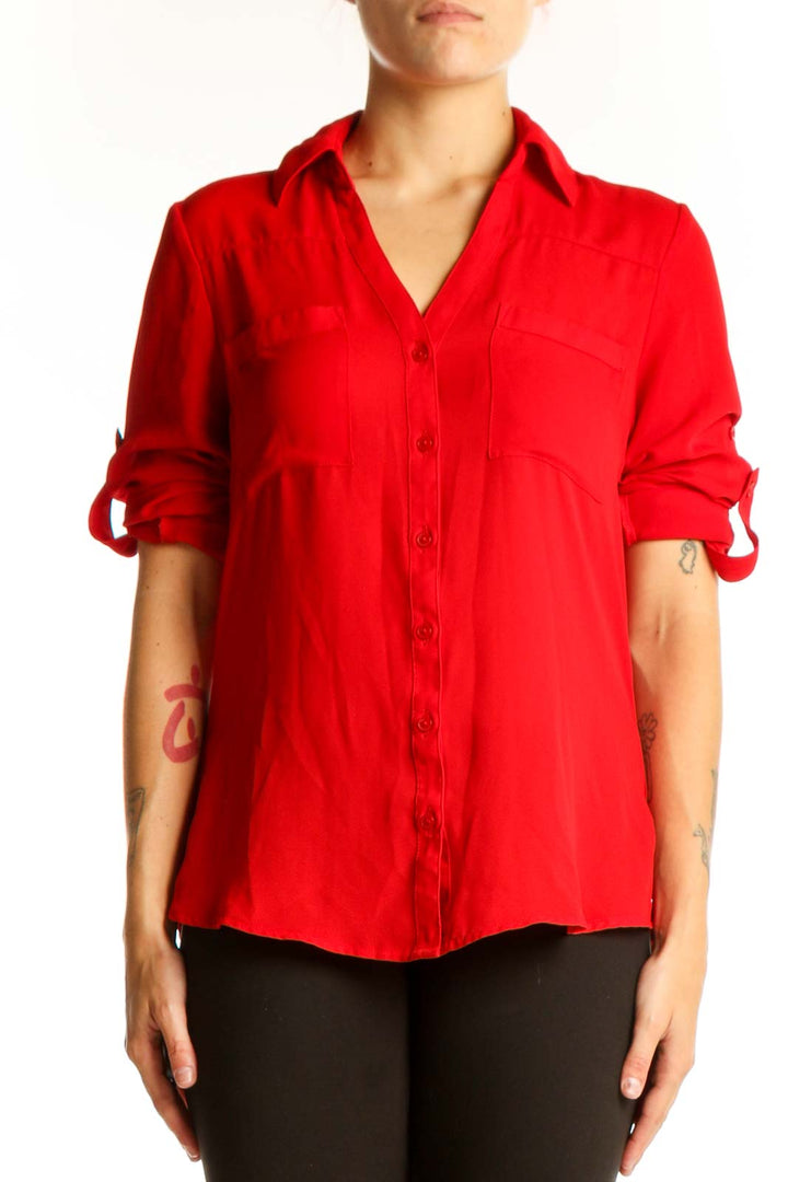 Front view of red Express polyester button-down blouse