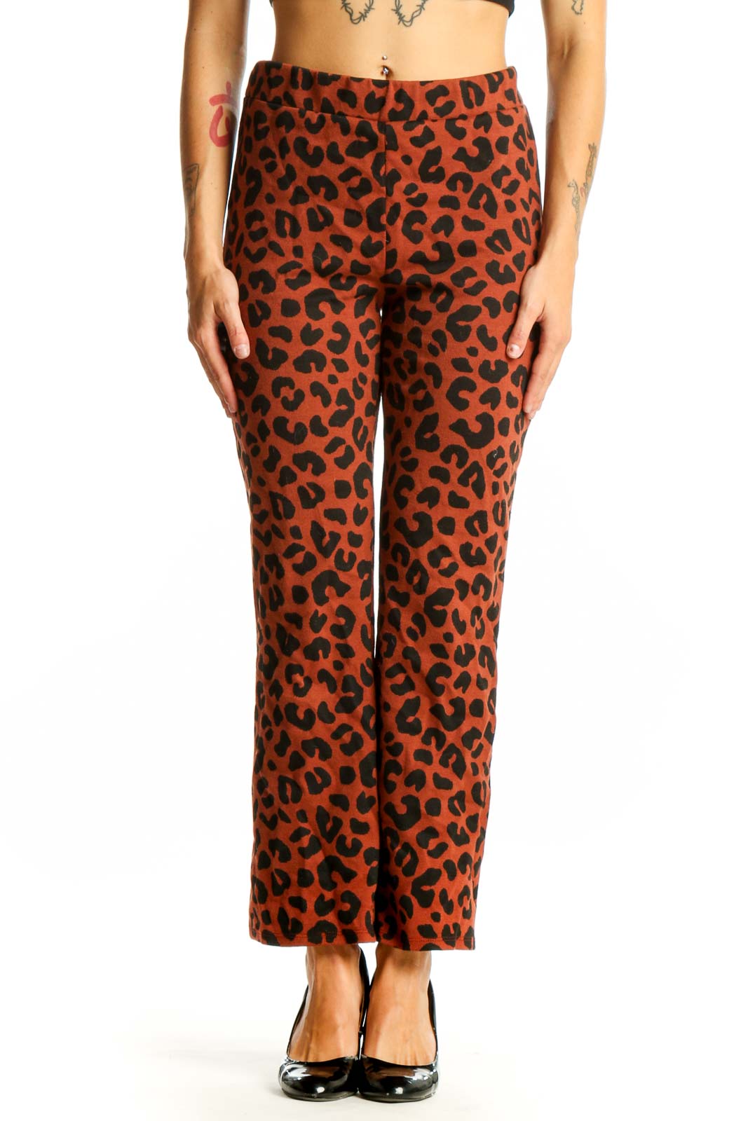 Front view of rust-colored leopard print straight leg pants