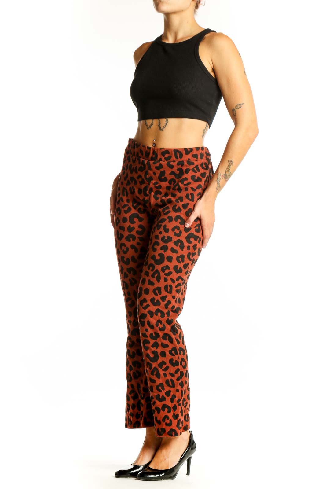 Front view of rust-colored leopard print straight leg pants