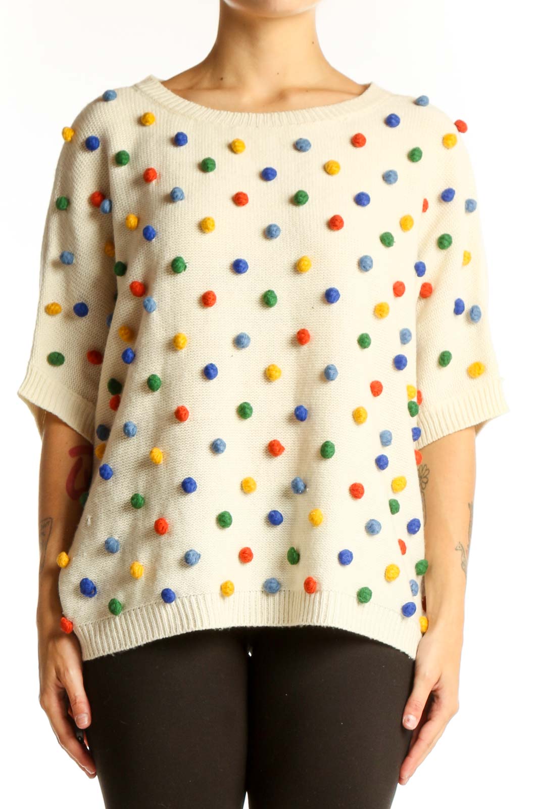 Front view of cream PepaLoves knit sweater with multicolored polka dots