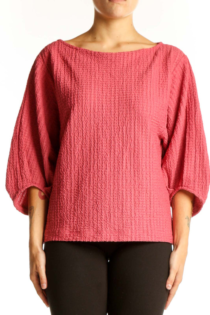 Front view of pink textured LOFT top with balloon sleeves