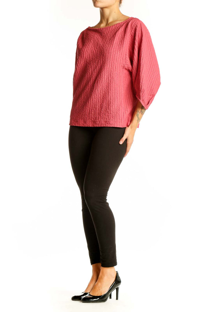 Front view of pink textured LOFT top with balloon sleeves