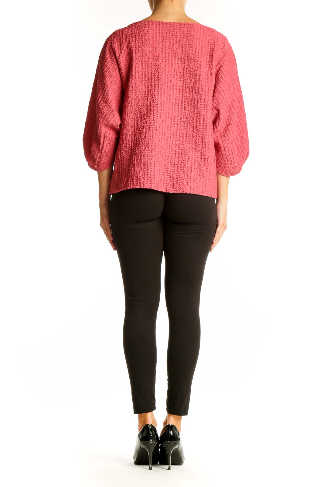 Side view of pink LOFT top showing balloon sleeves and fit