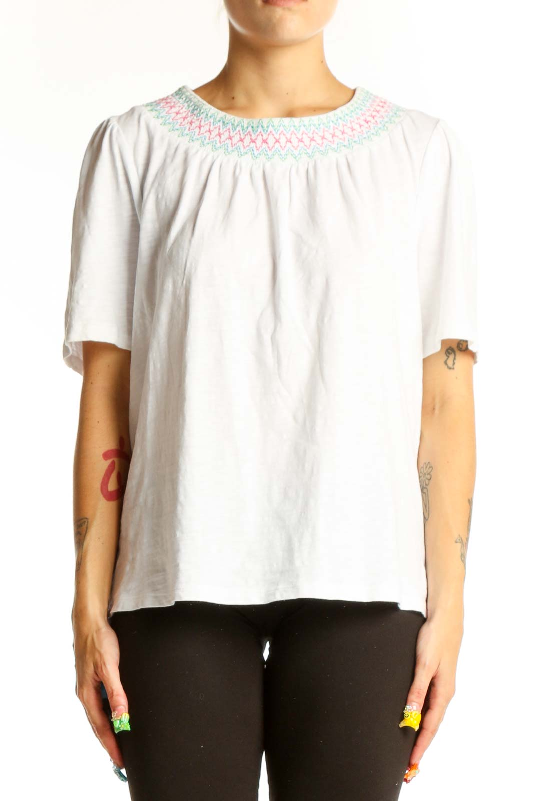 Front view of white Boden cotton top with embroidered neckline