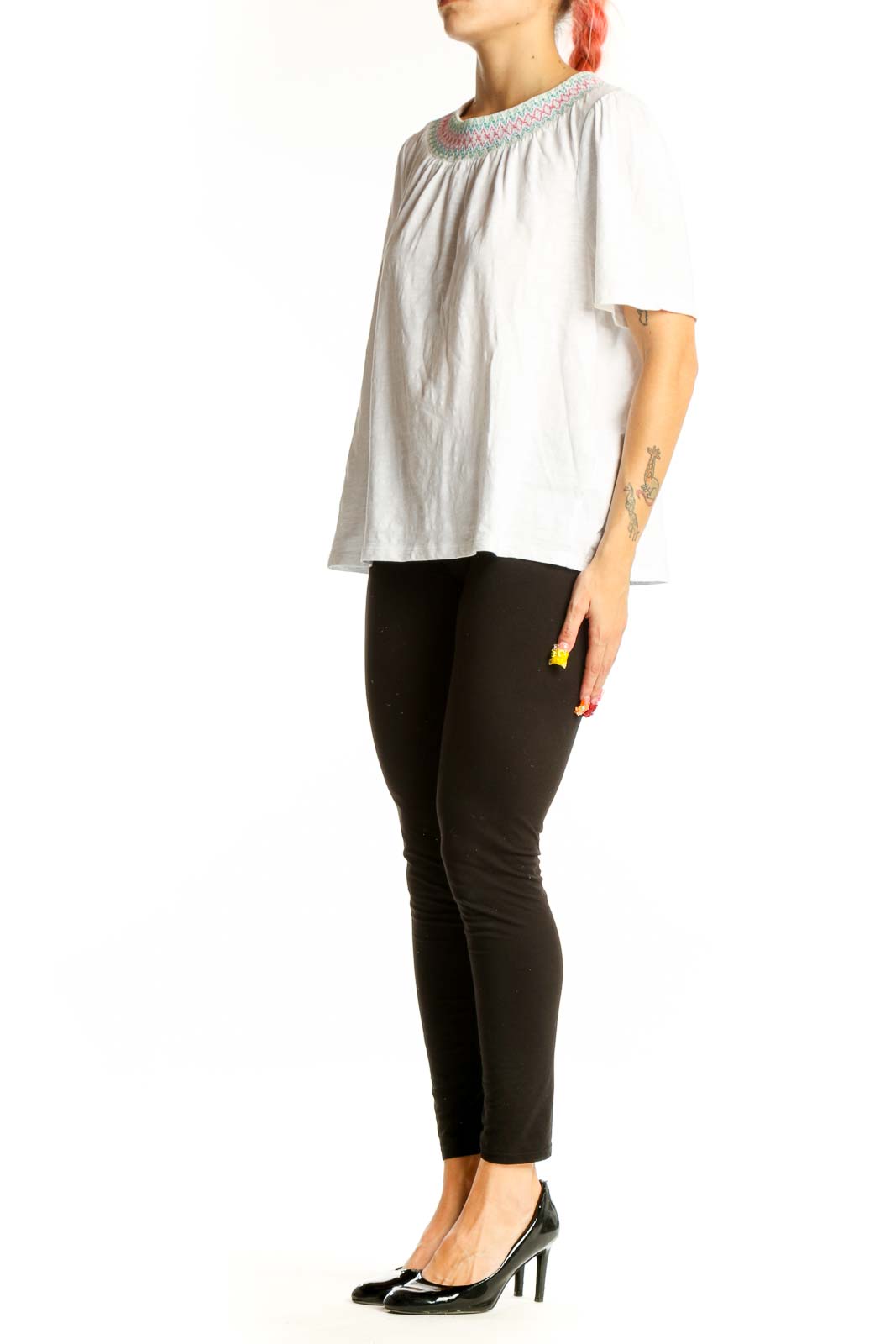 Front view of white Boden cotton top with embroidered neckline