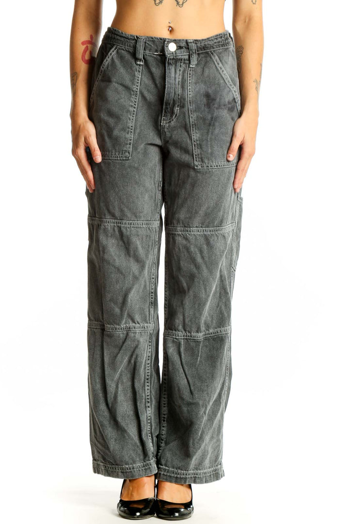 Front view of BDG gray washed cotton cargo jeans with wide legs and utility pockets