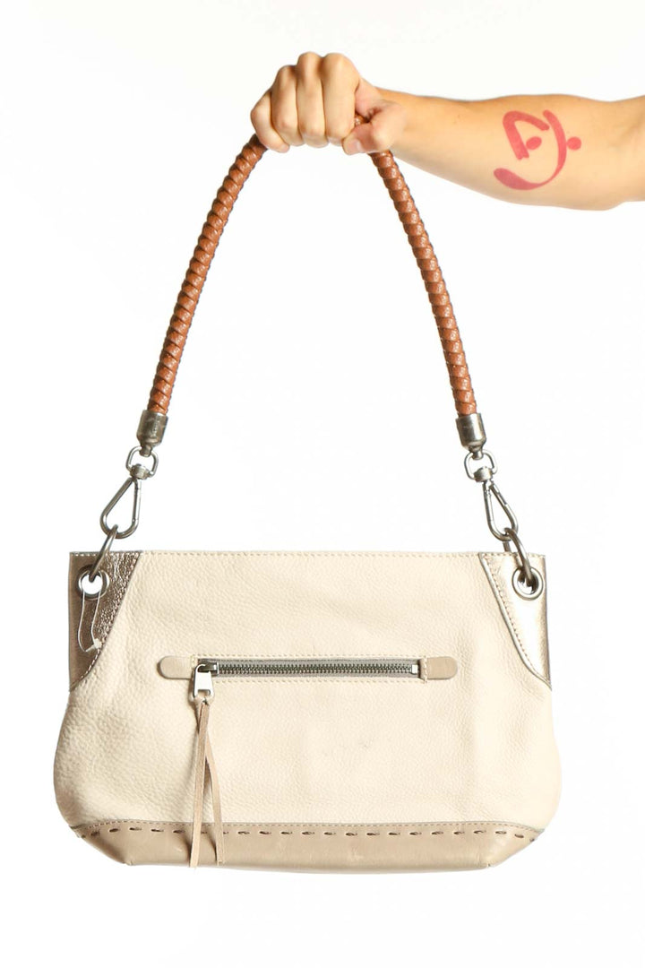 Front view of The SAK cream leather shoulder bag with braided handle