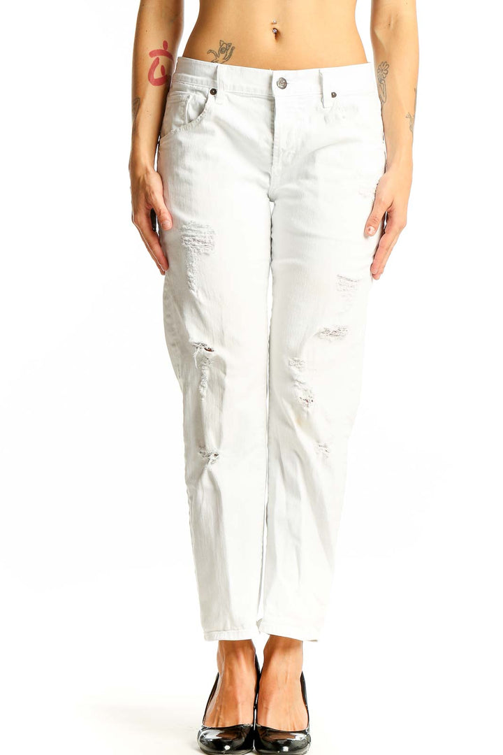Front view of white distressed slim fit jeans by Citizens of Humanity