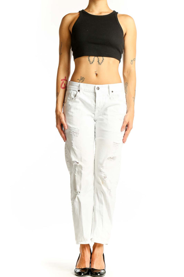 Front view of white distressed slim fit jeans by Citizens of Humanity