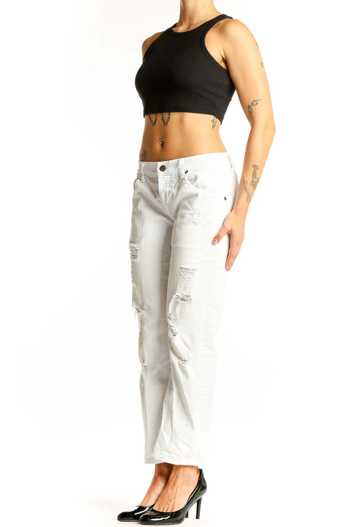 Front view of white distressed slim fit jeans by Citizens of Humanity