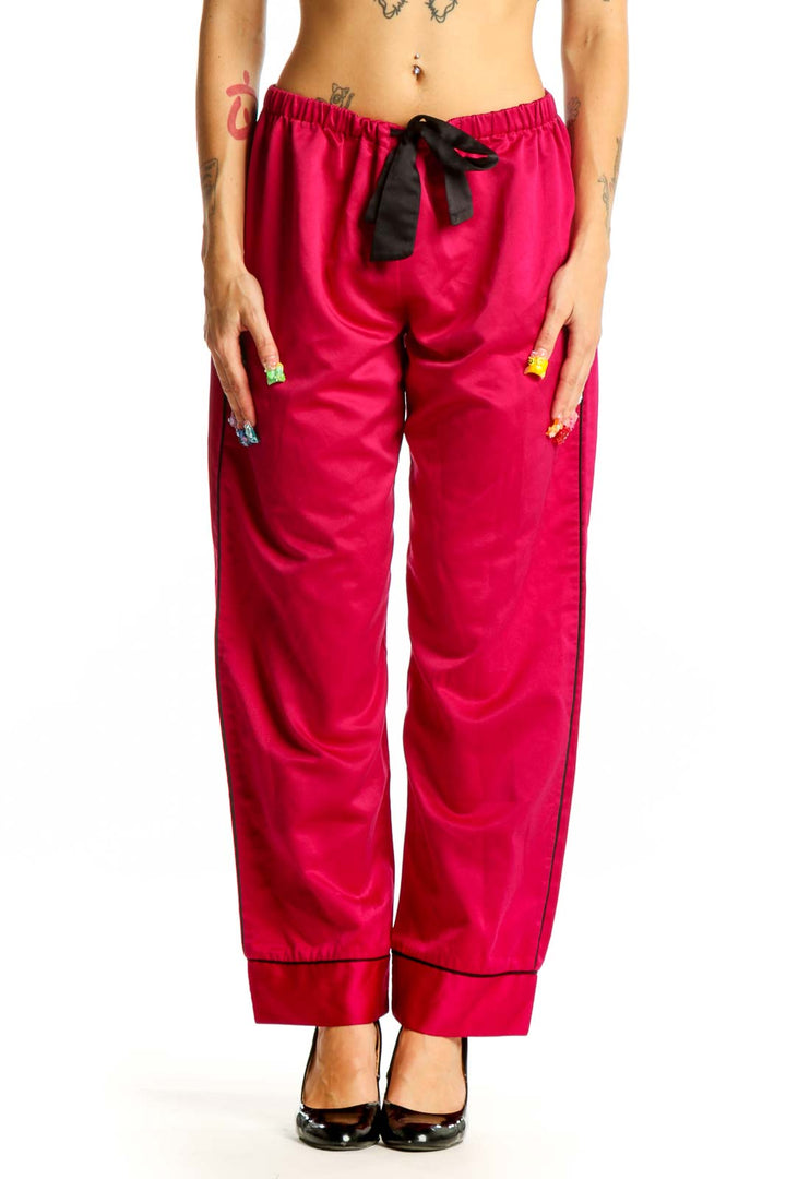 Front view of red Oscar de la Renta PINK LABEL lounge pants with black drawstring
